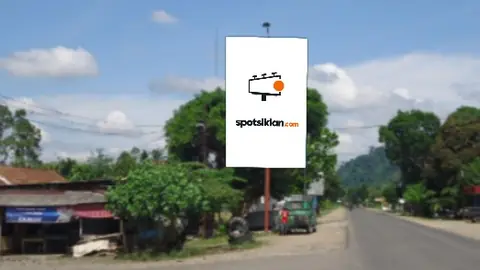 Baliho 4 × 6 m di Jl. Lintas Sumatera (Depan Hotel Umega), Dharmasraya, Sumatera Barat
