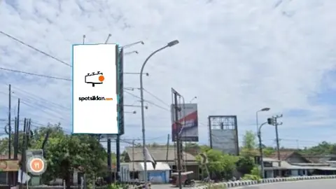 Billboard 5 × 10 m di Jl. Embong Miring (Menuju Koramil Perak), Jombang, Jawa Timur