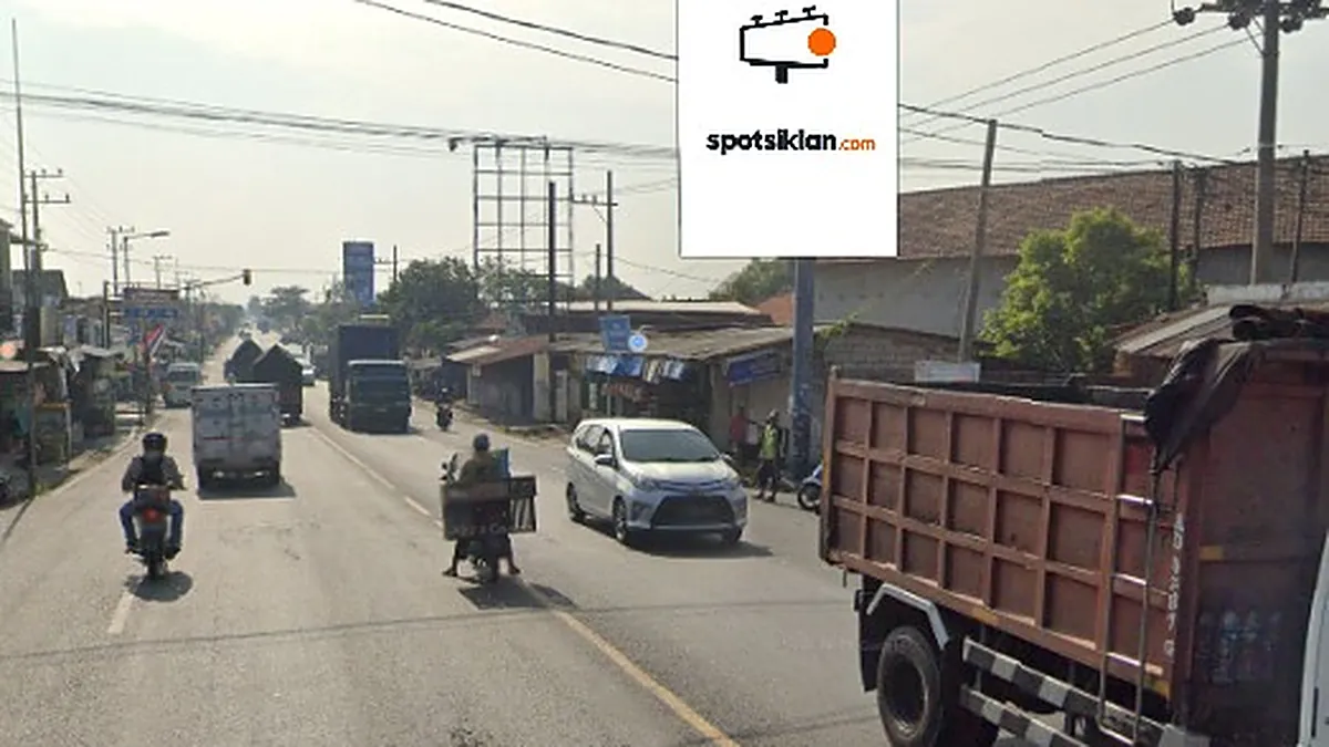 Baliho 4 × 6 m di Jl. Raya PB Sudirman (Pertigaan Mengkreng Jombang), Jawa Timur