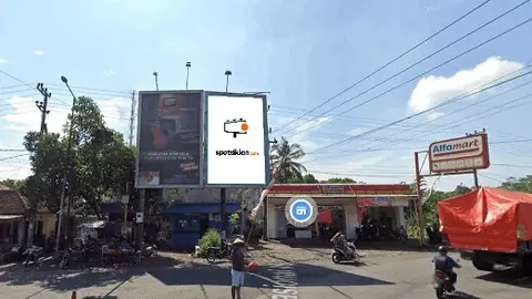 Baliho 6 × 4 m di Jl. PB Sudirman (Pertigaan Jl. PB Sudirman Depan Alfamart), Jember, Jawa Timur