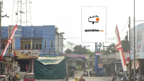 Baliho 4 × 6 m di Jl. Raya Rambipuji (Area Perempatan Pasar Balung), Jember, Jawa Timur
