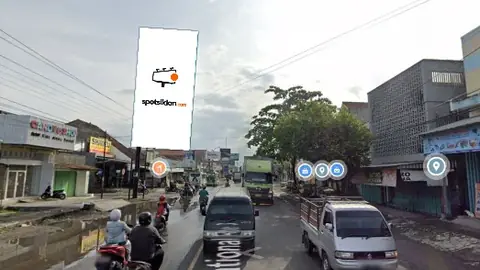 Billboard 10 × 5 m di Jl. Yos Sudarso (depan Pasar Wonokriyo), Kebumen, Jawa Tengah