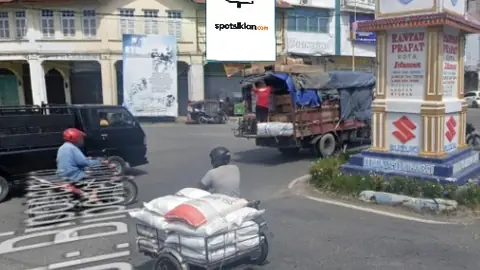 Baliho 4 × 6 m di Jl. Jenderal Sudirman (Area Tugu Simpang Empat), Labuhan Batu, Sumatera Utara