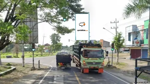 Billboard 8 × 4 m di Jl. Raya Ngawi-Caruban (Pertigaan Jl. Caruban Ngawi-Sutoyo Caruban (Arah Dari Surabaya)), Madiun, Jawa Timur