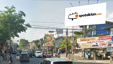 Billboard 8 × 4 m di Jl. Raya Ponorogo (Perempatan Pasar Pagotan), Madiun, Jawa Timur