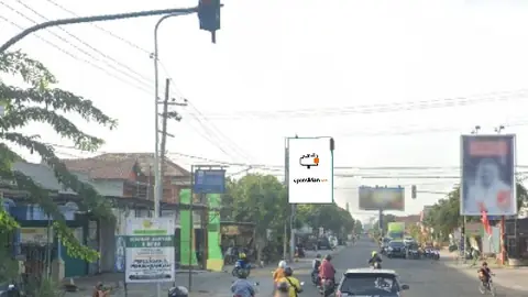Baliho 4 × 6 m di Jl. Raya Madiun-Ponorogo (Pasar Dlopo), Jawa Timur