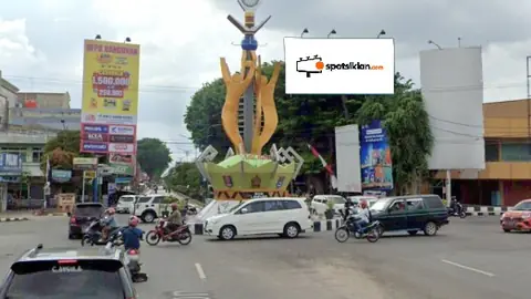 Billboard 10 × 5 m di Jl. Jend Sudirman (Bundaran Tugu Pena Metro), Lampung