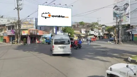 Billboard 5 × 10 m di Area Perempatan Jl. Veteran Malang, Jawa Timur
