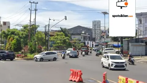 Billboard 5 × 10 m di Jl. RW Monginsidi (Depan RM Coto Maros Bahu, Arah RSUD ODSK Prov. Sulut), Manado, Sulawesi Utara