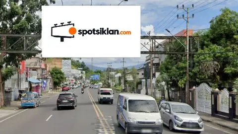 Bando Jalan 5 × 10 m di Jl. Yos Sudarso (Depan Pasar Segar Paal 2), Manado, Sulawesi Utara