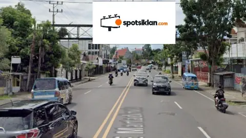 Bando Jalan 5 × 10 m di Jl. Yos Sudarso (Depan Pasar Segar Paal 2, Arah Lippo Plaza Manado), Sulawesi Utara