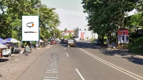 Baliho 6 × 4 m di Jl. Wolter Monginsidi (Depan SPBU Malalayang, Arah Universitas Trinata), Manado, Sulawesi Utara