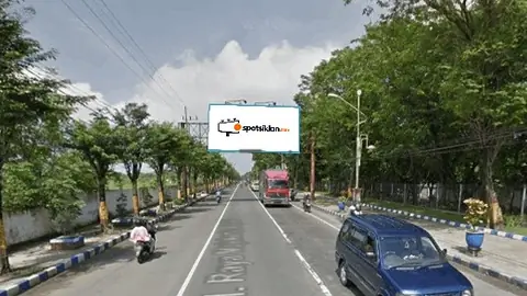 Billboard 5 × 10 m di Jl. Raya Gajahmada (Area Stadion Gajah Mada, Mojosari), Kabupaten Mojokerto, Jawa Timur