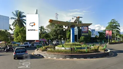 Billboard 10 × 5 m di Jl. Udayana (area Monumen Pesawat Terbang Selaparang), Mataram, Nusa Tenggara Barat