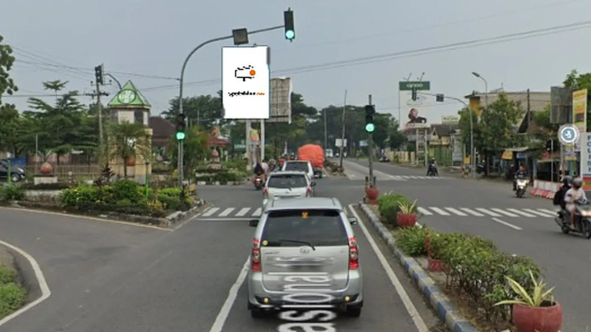 Baliho 6 × 4 m di Jl. Raya Madiun-Surabaya (Area Perempatan Pehserut), Nganjuk, Jawa Timur