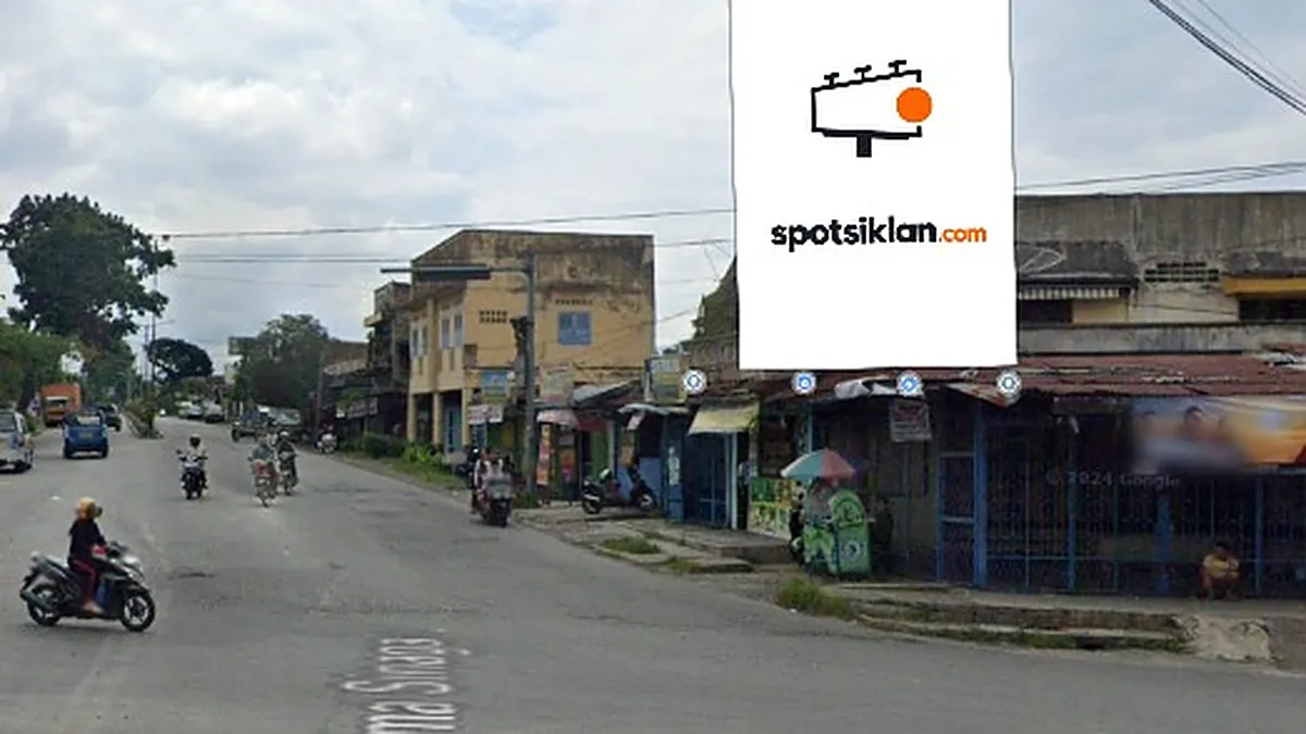 Baliho 6 × 4 m di Jl. Sisingamangaraja (Tugu Dayok Mirah), Pematang Siantar, Sumatera Utara