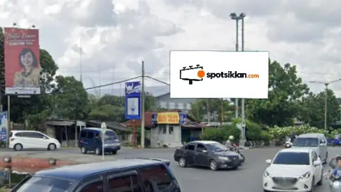 Billboard 5 × 10 m di Jl. Jend. Sudirman (Bundaran Berkoh Purwokerto), Jawa Tengah