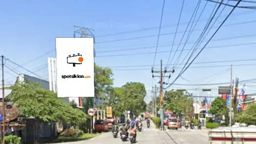Baliho 6 × 4 m di Jl. Perintis Kemerdekaan` (Perempatan Pancurawis Purwokerto), Jawa Tengah