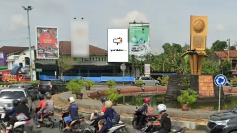 Baliho 6 × 4 m di Jl. Sudirman (area bunderan Air Mancur Berkoh), Purwokerto, Jawa Tengah