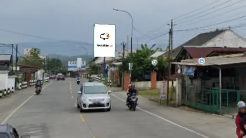 Baliho 6 × 4 m di Tikungan Jl. Raya Pengasinan (Arah Pasar Patikraja), Purwokerto, Jawa Tengah