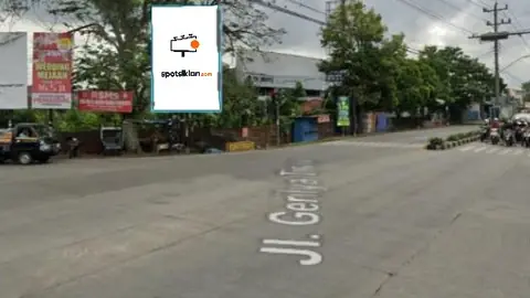 Baliho 6 × 4 m di Jl. Gerilya (Perempatan Jl. DI. Panjaitan), Purwokerto, Jawa Tengah