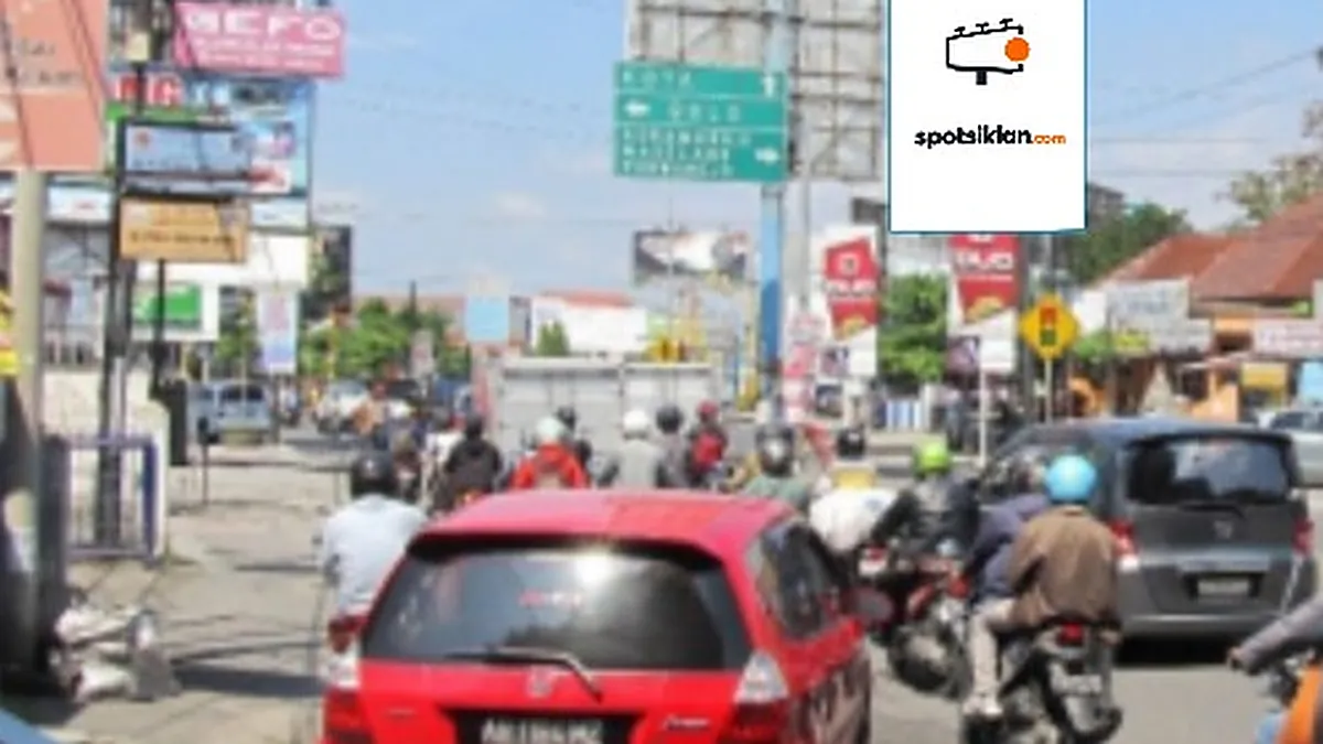 Baliho 6 × 4 m di Jl. Anggajaya (Perempatan Ring Road Condong Catur, Arah Kota Yogya), Sleman, DI Yogyakarta