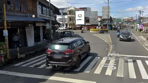 Baliho 6 × 4 m di Jl. Sam Ratulangi (Area Bundaran Tugu Dotu Tololiu), Tomohon, Sulawesi Utara