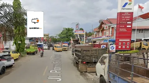 Baliho 4 × 6 m di Jl. Poros Bolu-Rantepao (Area Depan SPBU Pertamina Bolu), Toraja Utara, Sulawesi Selatan