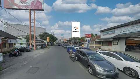 Billboard 5 × 10 m di Perempatan Ringroad Kentungan, Toko Merah. Jl. Kaliurang (View Dari Arah Selatan) Yogyakarta, DI Yogyakarta